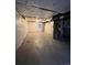 Unfinished basement with plumbing and HVAC systems at 5046 Espana Way, Denver, CO 80249