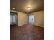 Spacious basement with neutral carpeting and ample natural light at 5046 Espana Way, Denver, CO 80249