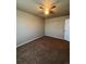 Spacious bedroom with carpeted floor and ceiling fan at 5046 Espana Way, Denver, CO 80249