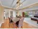 Elegant dining room with hardwood floors and a modern light fixture at 106 Cherry St, Castle Rock, CO 80104