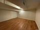 Spacious finished basement room with hardwood floors at 1453 Chester St, Aurora, CO 80010