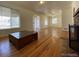 Bright living room featuring hardwood floors and a fireplace at 1453 Chester St, Aurora, CO 80010