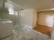 Basement laundry room with washer, dryer, and marble tile floors at 1453 Chester St, Aurora, CO 80010