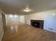 Finished basement with hardwood floors, fireplace, and ample space at 1453 Chester St, Aurora, CO 80010