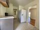 Modern kitchen with new cabinets, flooring and appliances at 1453 Chester St, Aurora, CO 80010