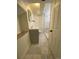 Basement bathroom with marble tile floors and shower at 1453 Chester St, Aurora, CO 80010