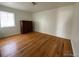 Spacious bedroom with hardwood floors and ample natural light at 1453 Chester St, Aurora, CO 80010