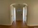 Classic entryway with hardwood floors and glass block windows at 1453 Chester St, Aurora, CO 80010