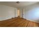 Hardwood floors and neutral walls in this bright bedroom at 1453 Chester St, Aurora, CO 80010