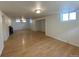 Spacious finished basement with hardwood floors and a fireplace at 1453 Chester St, Aurora, CO 80010