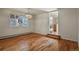 Spacious dining room with hardwood floors and chandelier at 28730 Mountain View Rd, Conifer, CO 80433