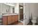 Bathroom with double vanity, shower, and tiled floors at 28730 Mountain View Rd, Conifer, CO 80433