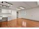Bright office with wood floors, built-in cabinets, and ample workspace at 28730 Mountain View Rd, Conifer, CO 80433