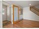 Entryway with wood floors and access to other rooms at 28730 Mountain View Rd, Conifer, CO 80433