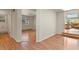 Bright entryway with wood floors and views to living areas at 28730 Mountain View Rd, Conifer, CO 80433