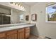 Clean bathroom, with shower, vanity, and large mirror at 28730 Mountain View Rd, Conifer, CO 80433