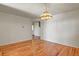 Bright dining room with hardwood floors and chandelier at 28730 Mountain View Rd, Conifer, CO 80433