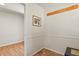 Small closet with wood floors and coat rack at 28730 Mountain View Rd, Conifer, CO 80433