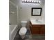 Bathroom with vanity, toilet, and bathtub at 4361 Argonne St, Denver, CO 80249