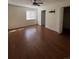 Spacious bedroom with laminate floors and ceiling fan at 4361 Argonne St, Denver, CO 80249