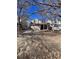 Two-story house with attached garage and landscaping at 4361 Argonne St, Denver, CO 80249