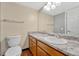 Clean bathroom with granite countertop and single sink at 13962 E Stanford Cir # L08, Aurora, CO 80015