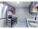 Modern kitchen with stainless steel appliances at 12171 Melody Dr # 102, Denver, CO 80234