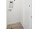 Small laundry room with hookups and vinyl flooring at 1281 Penner Dr, Erie, CO 80026