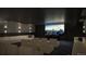 Residential theater with comfortable seating and large screen at 12983 W Ida Ave # 200, Littleton, CO 80127