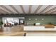 Modern building lobby with stylish reception desk and comfortable seating area at 12983 W Ida Ave # 200, Littleton, CO 80127