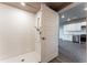 Modern bathroom with a walk-in shower and white subway tile at 12983 W Ida Ave # 200, Littleton, CO 80127