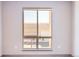 Bedroom with a large window offering an exterior view at 12983 W Ida Ave # 200, Littleton, CO 80127