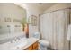 Clean bathroom with shower/tub combo, vanity, and updated fixtures at 11355 W 84Th Pl # D, Arvada, CO 80005