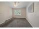 Bright bedroom with ceiling fan and neutral carpeting at 750 Copper Ln # 102, Louisville, CO 80027