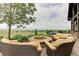 Landscaped backyard with fire pit and scenic mountain views at 5764 Amber Ridge Dr, Castle Pines, CO 80108