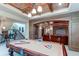 Basement recreation area with pool table and home theater at 5764 Amber Ridge Dr, Castle Pines, CO 80108