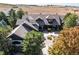 Aerial view of house and surrounding landscape at 5764 Amber Ridge Dr, Castle Pines, CO 80108
