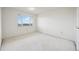 Bedroom with a window offering an outdoor view at 1313 Steele St # 801, Denver, CO 80206