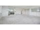 Living room with built-in shelving and a fireplace at 1313 Steele St # 801, Denver, CO 80206