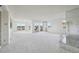 Spacious living room with large windows and a fireplace at 1313 Steele St # 801, Denver, CO 80206