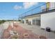 A rooftop patio with plants and seating area at 1313 Steele St # 801, Denver, CO 80206