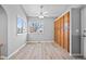 Breakfast nook with large windows, wood-look flooring, and built-in cabinetry at 1012 E 130Th Pl, Thornton, CO 80241