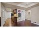 Basement kitchenette with wood cabinets, granite counters, and modern appliances at 17027 Pale Anemone St, Parker, CO 80134