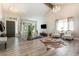 Bright and airy entryway with hardwood floors, and view of living room at 15913 E Lehigh Cir, Aurora, CO 80013