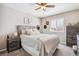Bedroom with wooden bed frame and gray carpeting at 944 Mcmurdo Cir, Castle Rock, CO 80108
