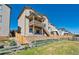 Two-story home with a large deck, stairs, and fenced backyard at 944 Mcmurdo Cir, Castle Rock, CO 80108
