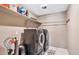Laundry room with washer, dryer, and ample shelving at 944 Mcmurdo Cir, Castle Rock, CO 80108