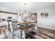 Modern kitchen boasts white cabinets, stainless steel appliances, and a large island at 944 Mcmurdo Cir, Castle Rock, CO 80108