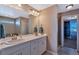Bathroom with double vanity and walk-in shower at 944 Mcmurdo Cir, Castle Rock, CO 80108