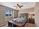 Bedroom with ceiling fan and a window with a view at 944 Mcmurdo Cir, Castle Rock, CO 80108
